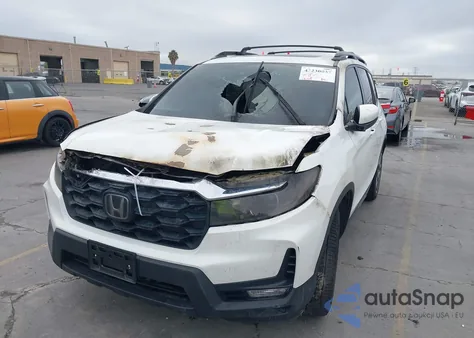 2022 Honda Passport Exl from USA, damaged, VIN 5FNYF7H59NB002610